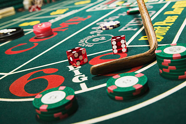 Croupier stick clearing craps table Wagerr stock pictures, royalty-free photos & images